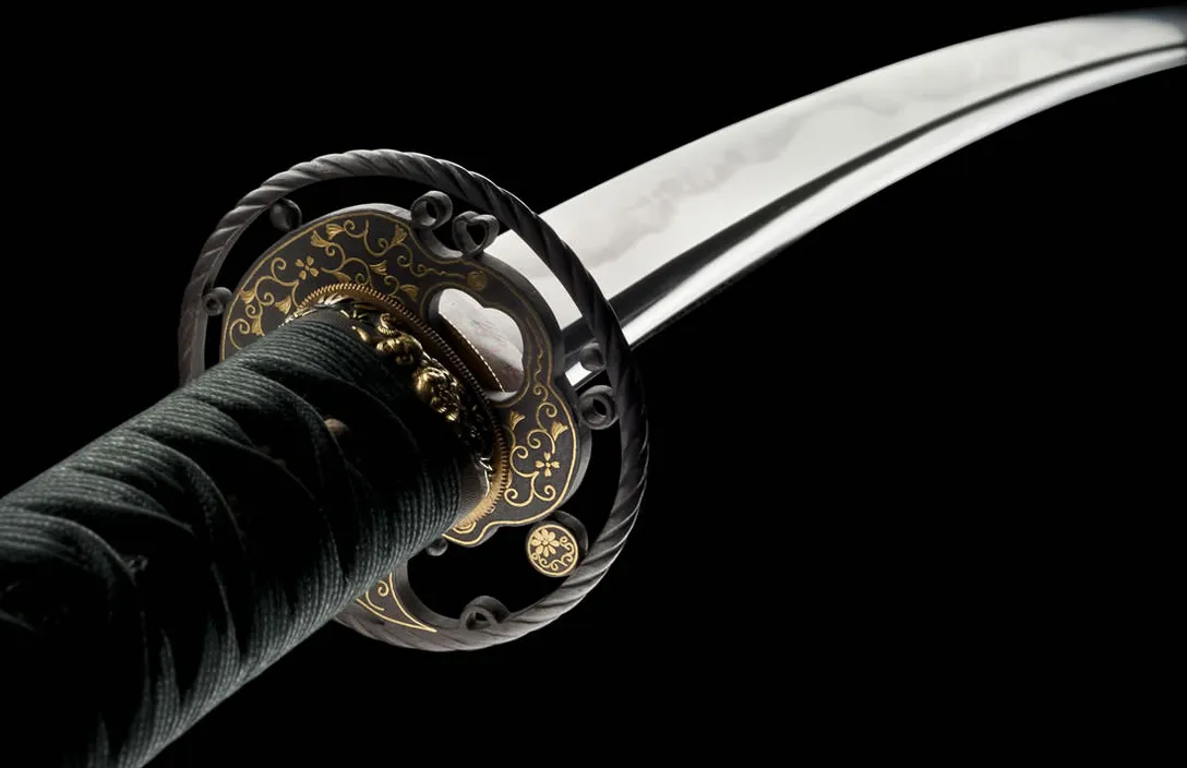 a black and gold sword with a black handle, 