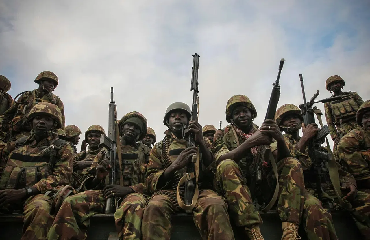 a group of soldiers sitting on top of a truck