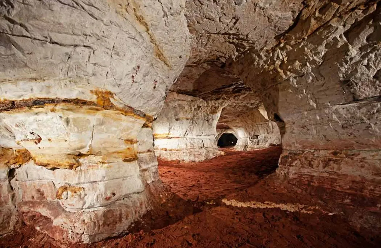 a cave filled with lots of dirt and rocks