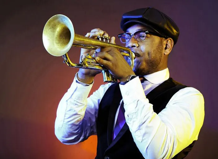 a man in a hat and glasses playing a trumpet. Heavy rain. Film Noir. Film grain texture. Bleak colors. No umbrella. 30-s Prohibition street.