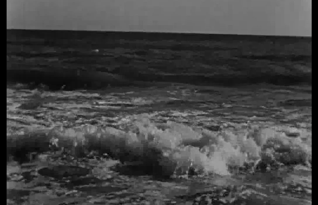 a black and white photo of the ocean