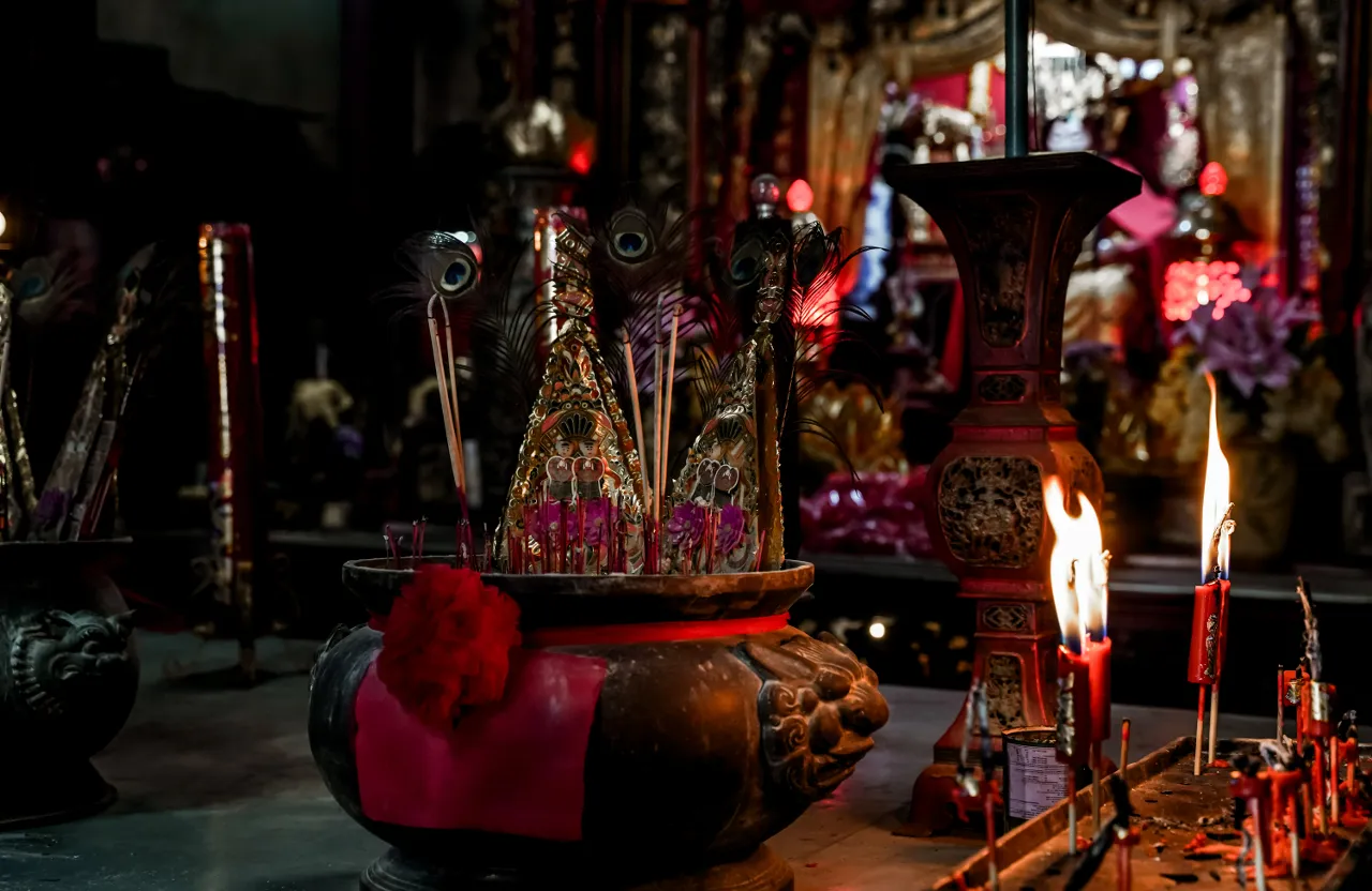 a group of candles sitting on top of a table