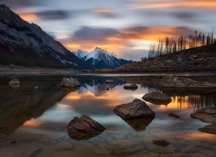 a mountain lake surrounded by rocks and trees