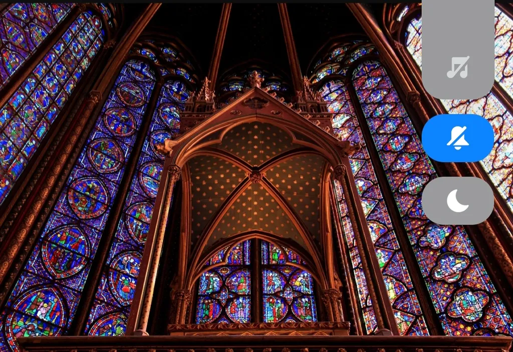 a large stained glass window in a building