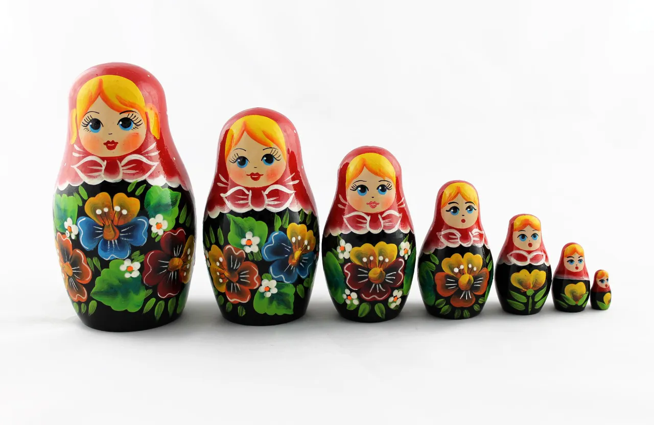 a group of colorful nesting dolls sitting next to each other