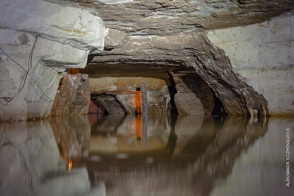 a large body of water inside of a cave