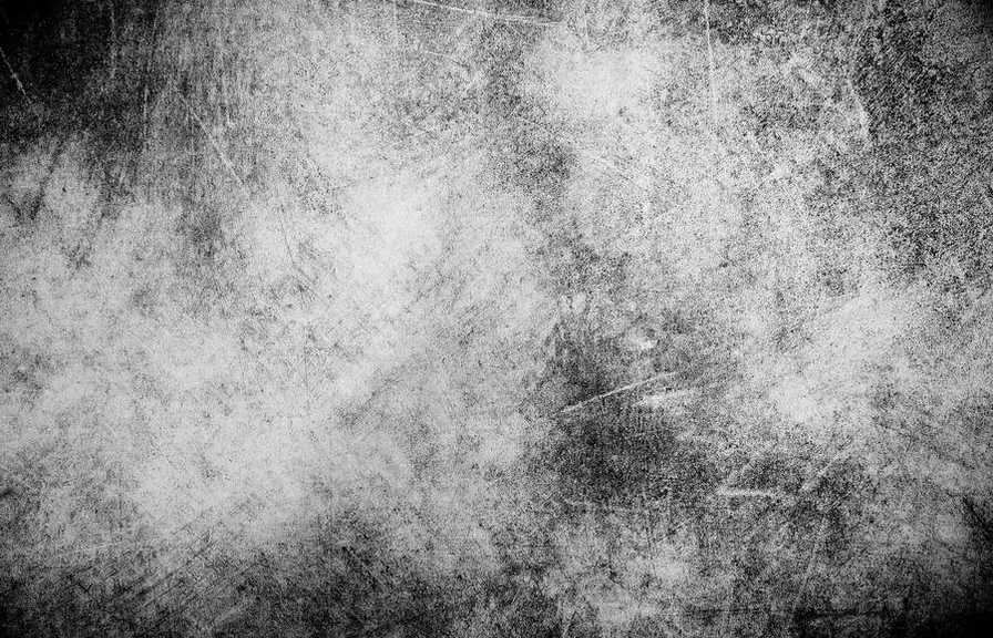 a black and white photo of a grungy surface