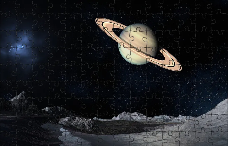 a puzzle piece with a picture of a saturn on it