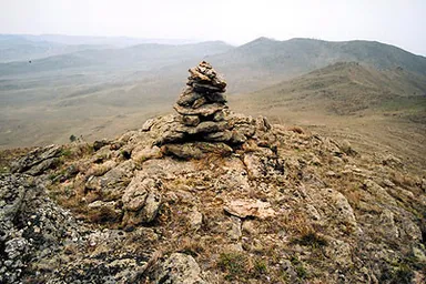 a pile of rocks sitting on top of a mountain