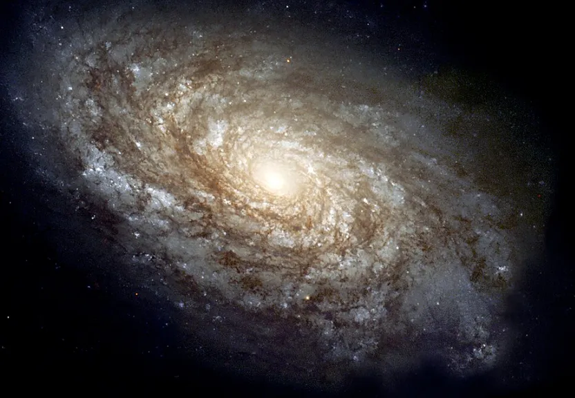 a spiral galaxy with a bright light in the center (NGC 4414)