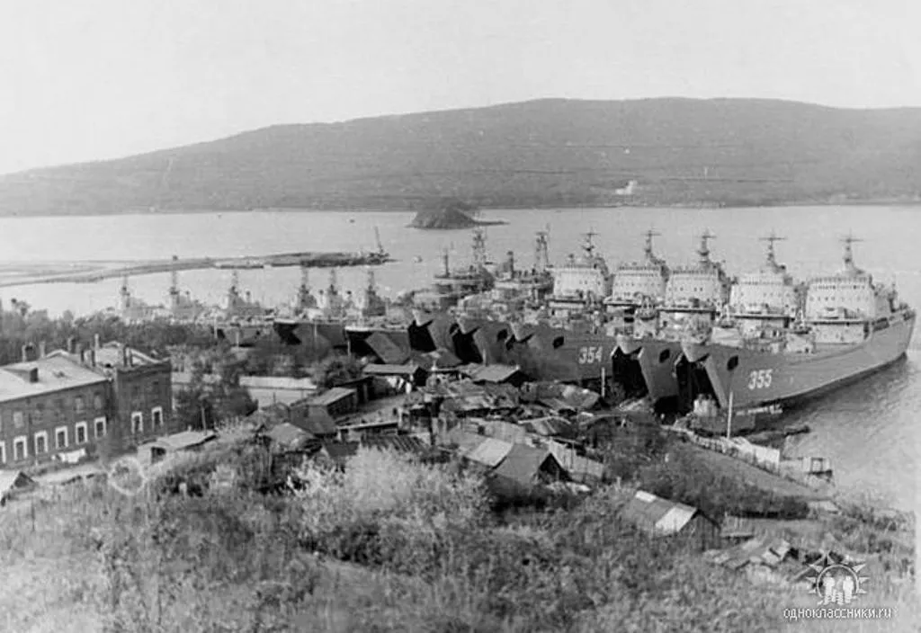 a black and white photo of a large ship in the water