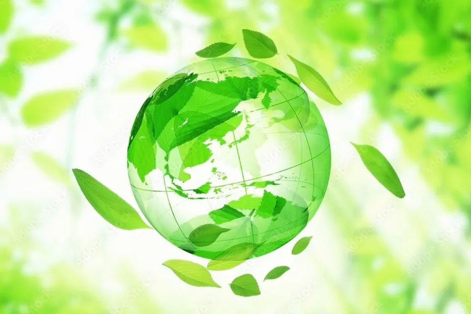 a green sphere with transparent leaves floating around it