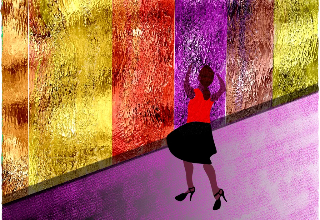 the woman walks along the colorful wall as it changes hues