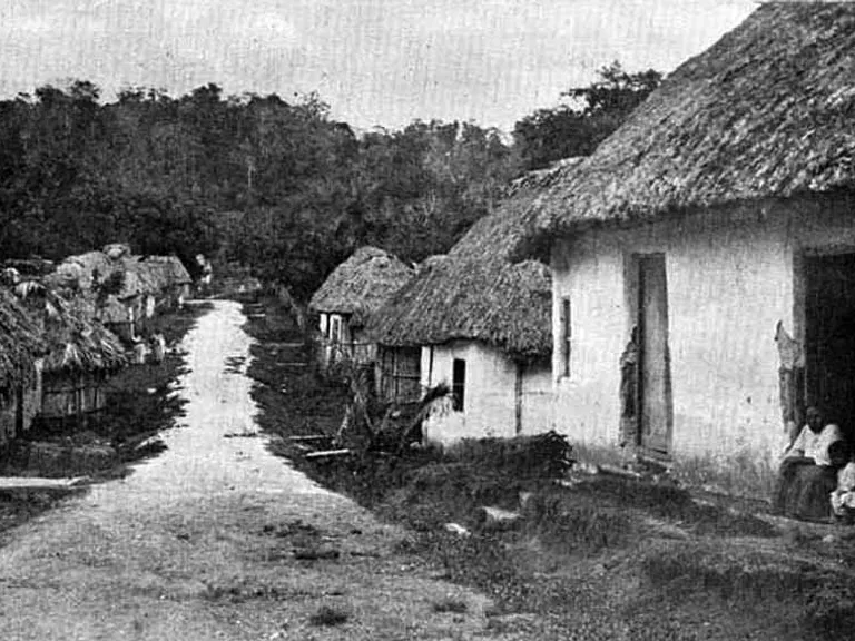 a black and white photo of a village