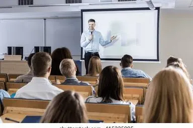 a man giving a presentation to a group of people