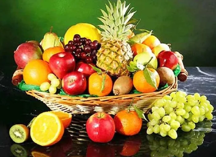 a basket filled with lots of different types of fruit