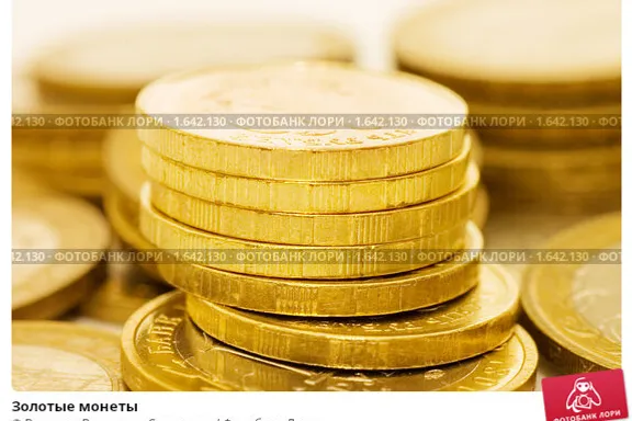 a pile of gold coins sitting on top of each other