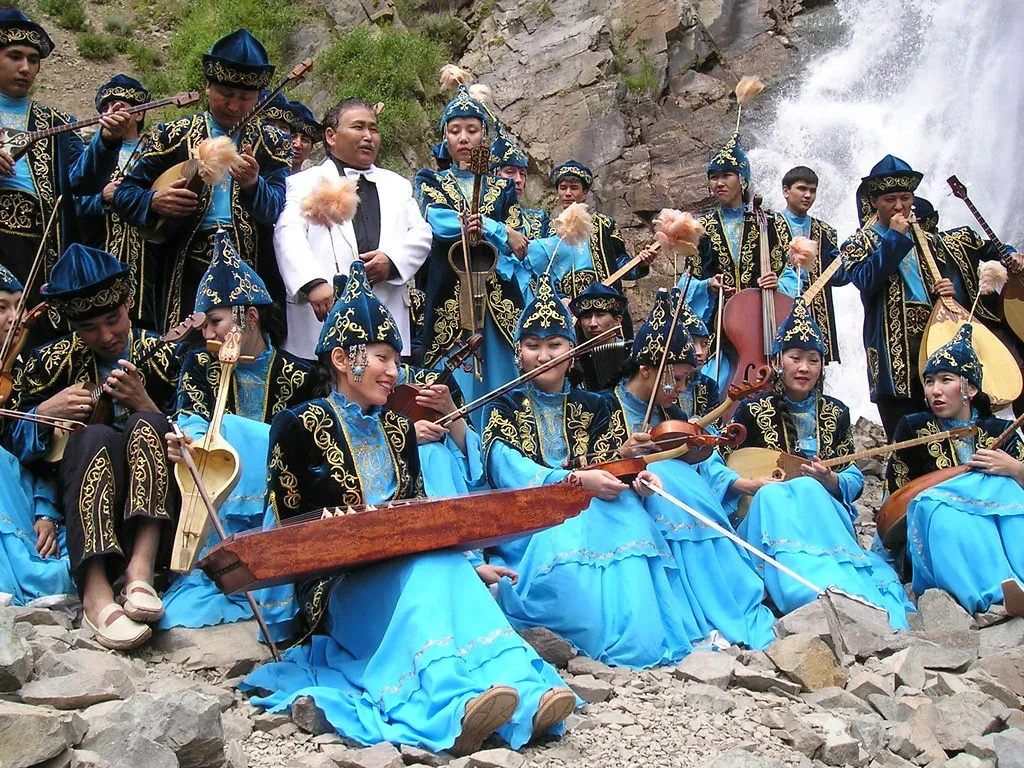 a group of people dressed in blue and black