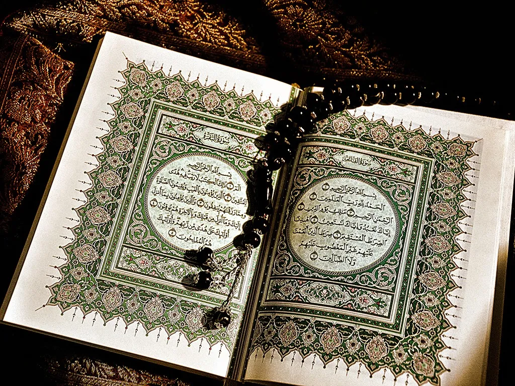 a close up of an open book on a table