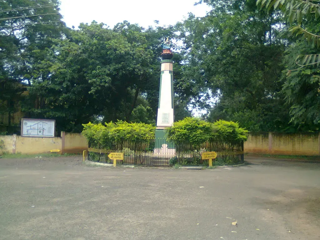 an college founding stone and tower