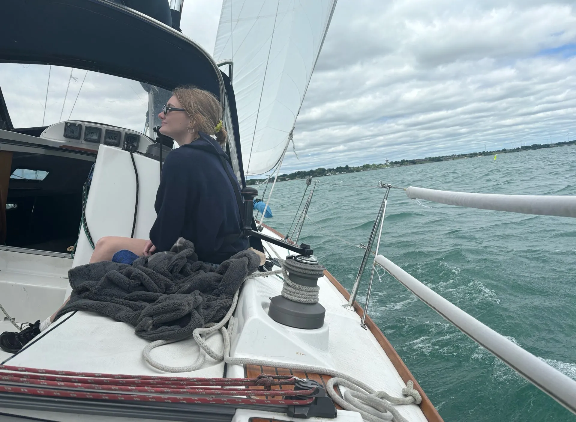 girl on boat turns and smiles, advertising style