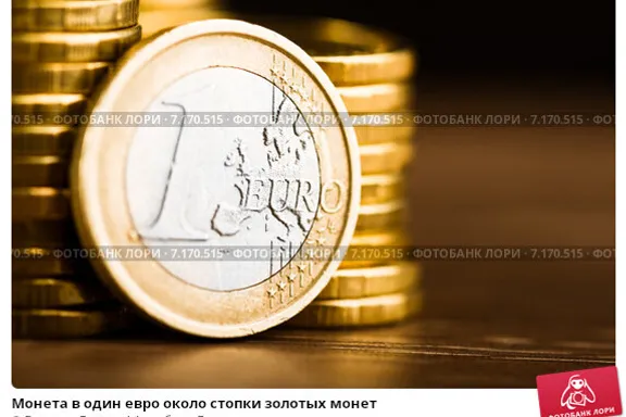 a stack of coins sitting on top of a table