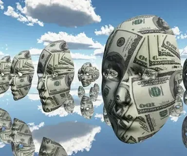 a group of dollar bills floating in the air