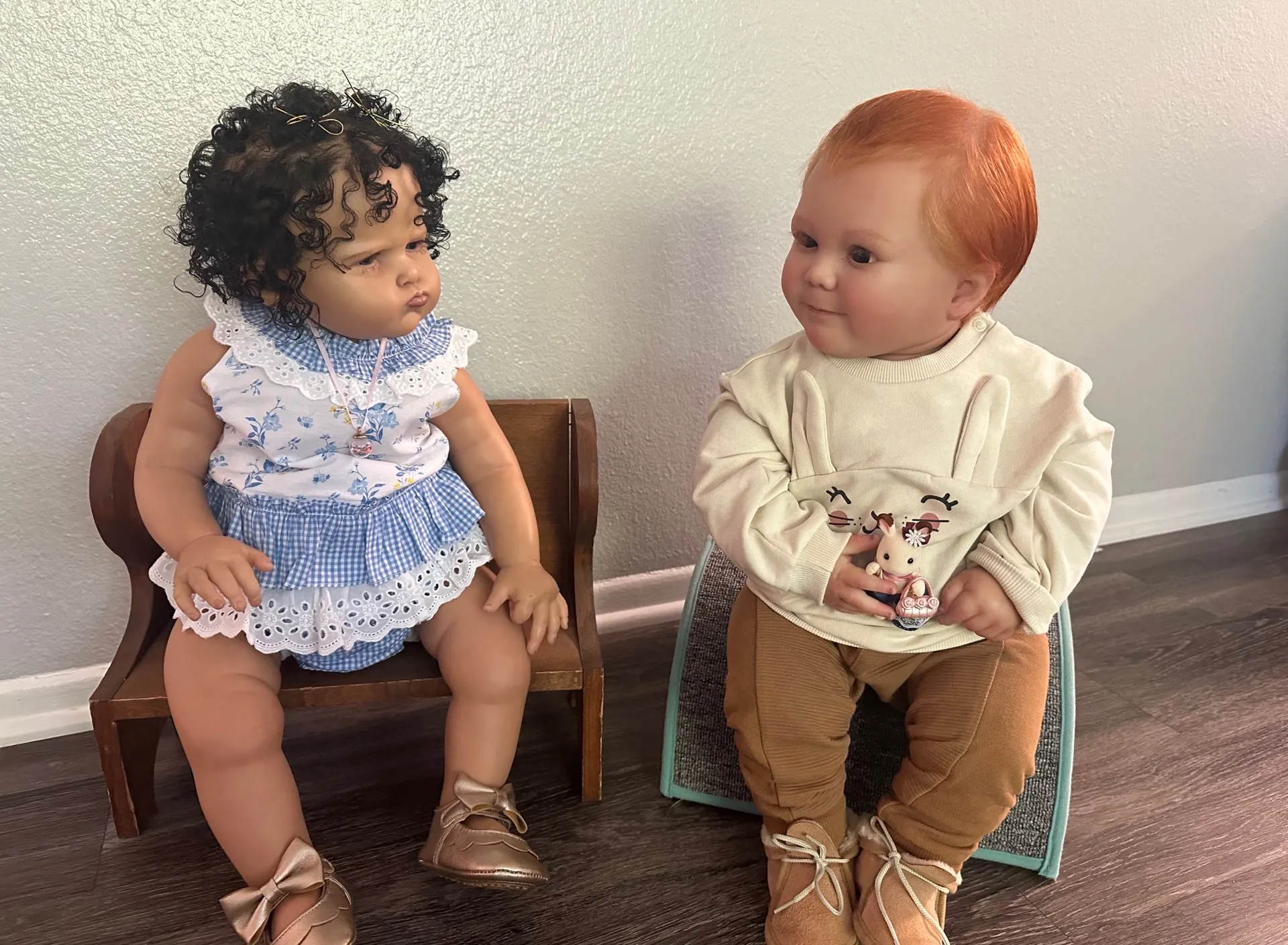 two little girls talking. pouty girl gets upset with redhead. , advertising style