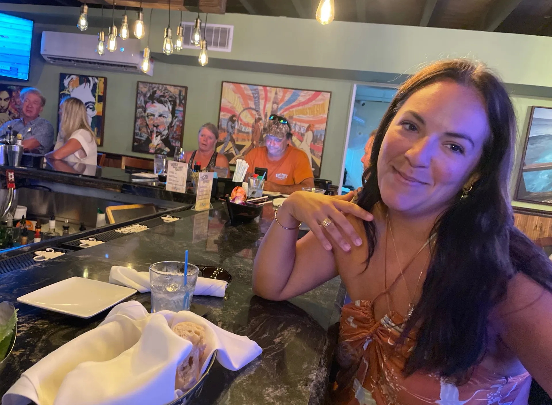 girl says thank you and drinks here drink with food in front of her, advertising style