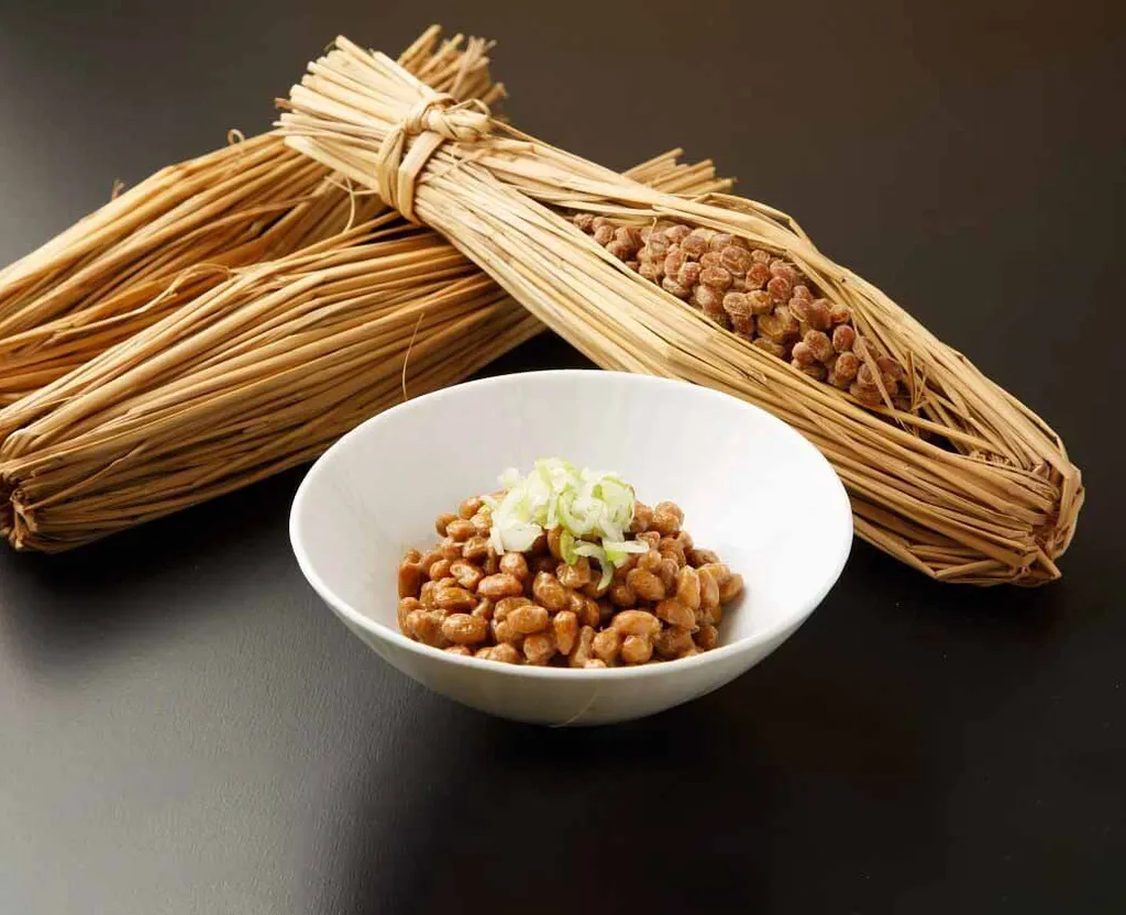 a bowl of food sitting on top of a table