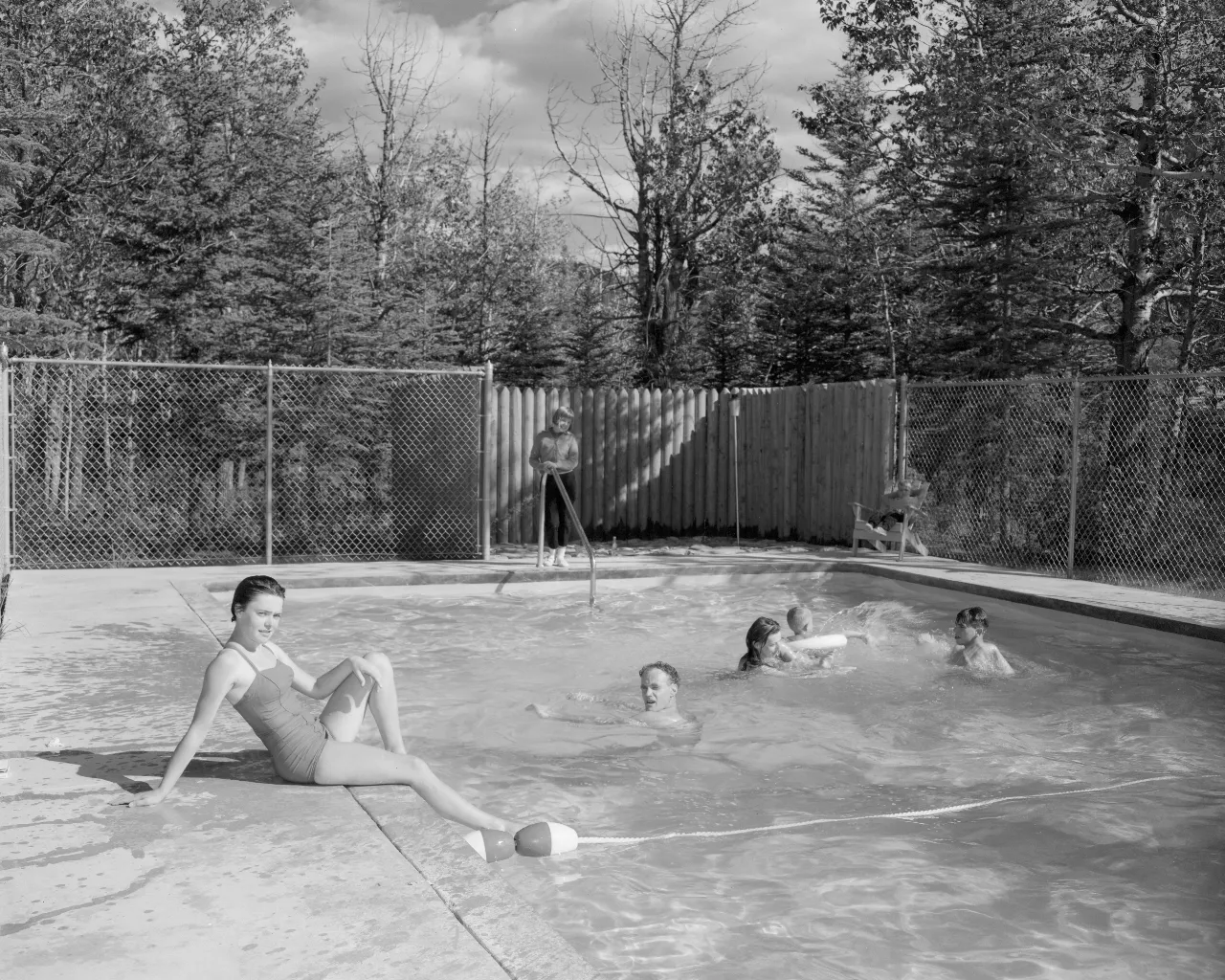 a group of people in a swimming pool