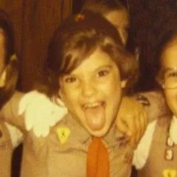 an excited girl scout