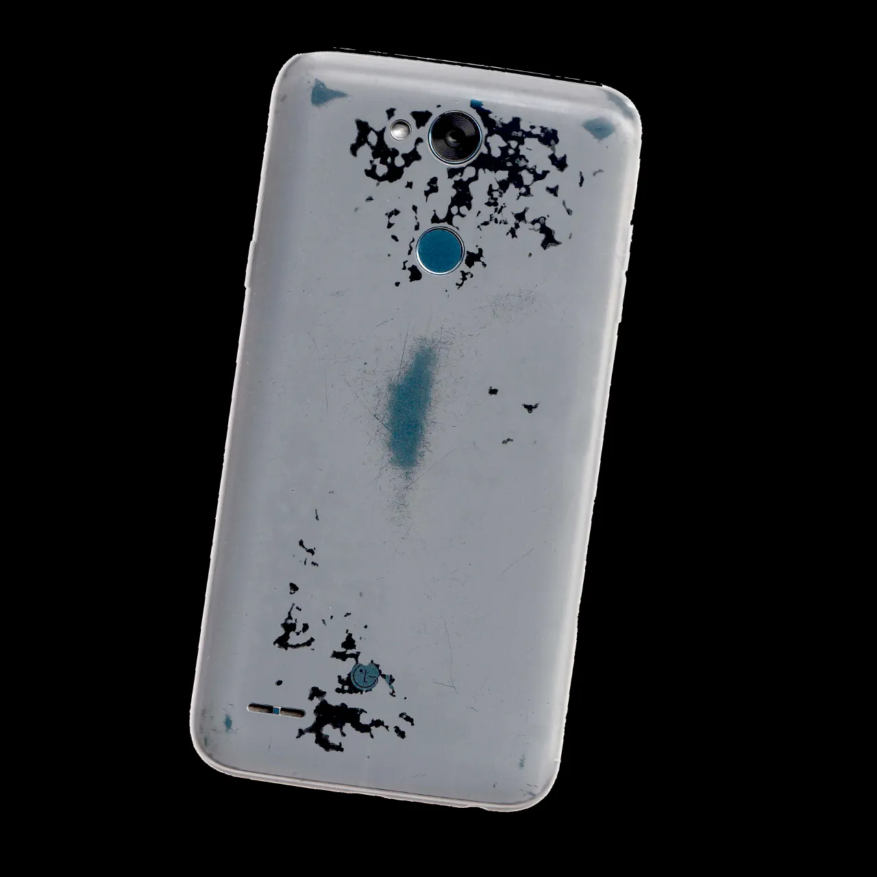 the back of a white cell phone with blue paint splattered on it