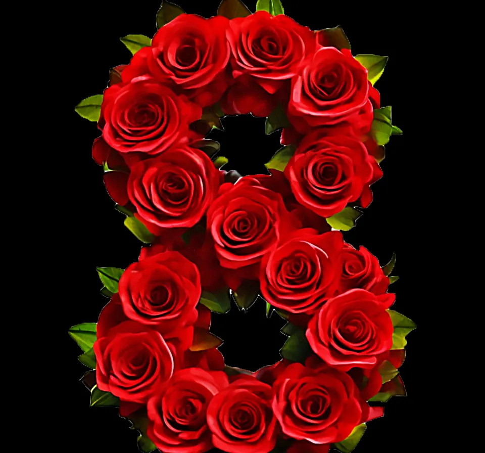 a bunch of red roses arranged in the shape of the number eight