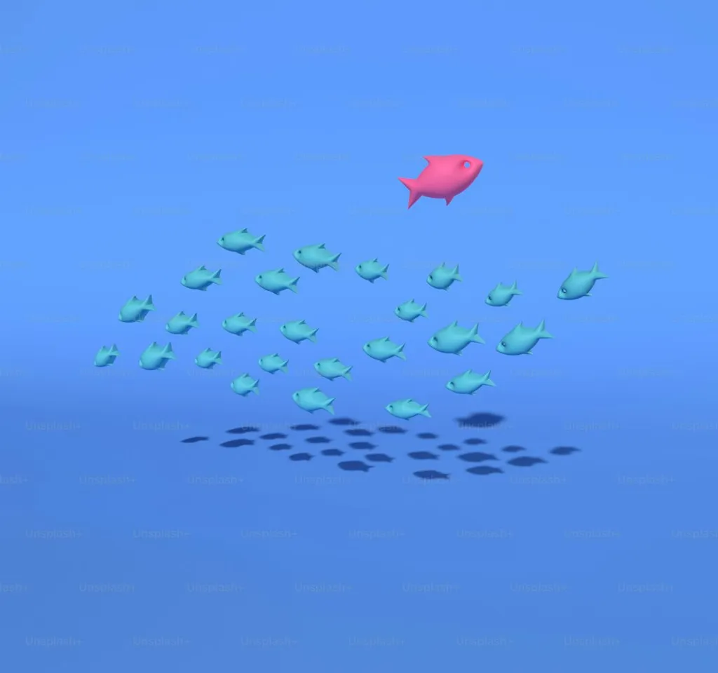 a group of fish swimming in the ocean