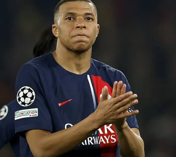 Mbappe holding his hands together