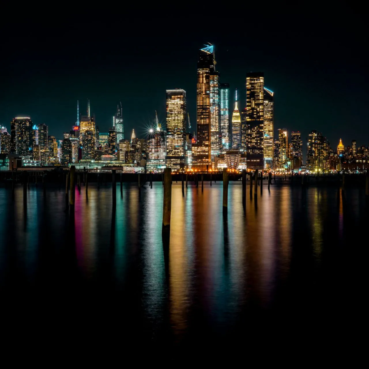 a view of a city at night from across the water