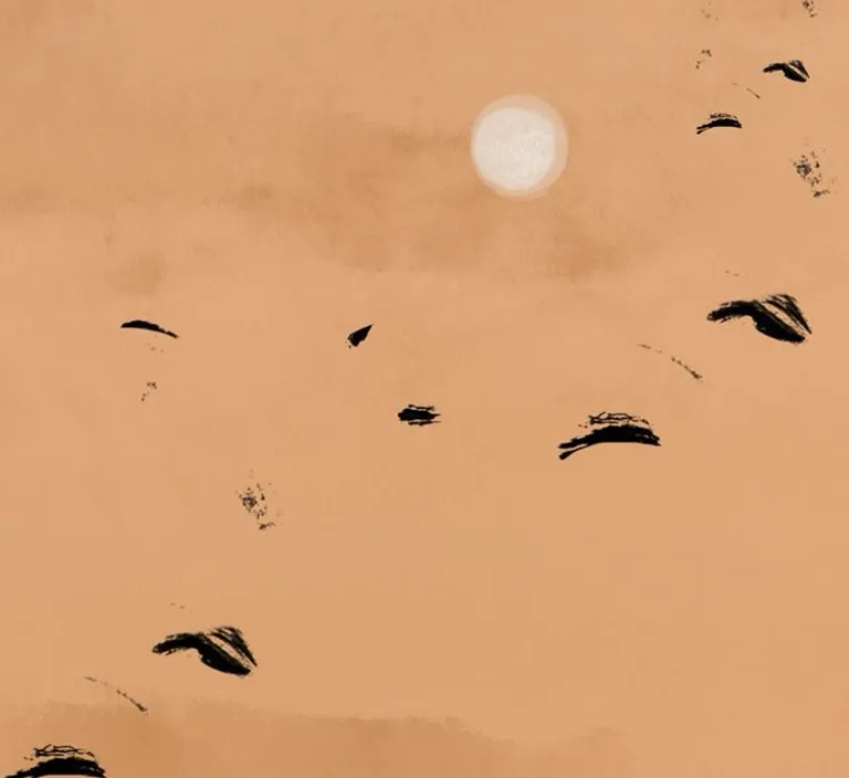 a group of birds flying over a sandy beach