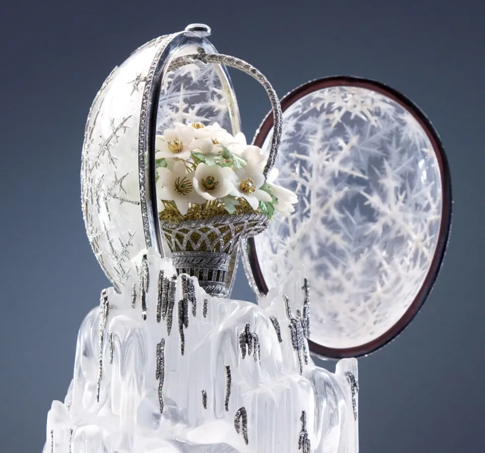 a vase filled with flowers sitting on top of a table