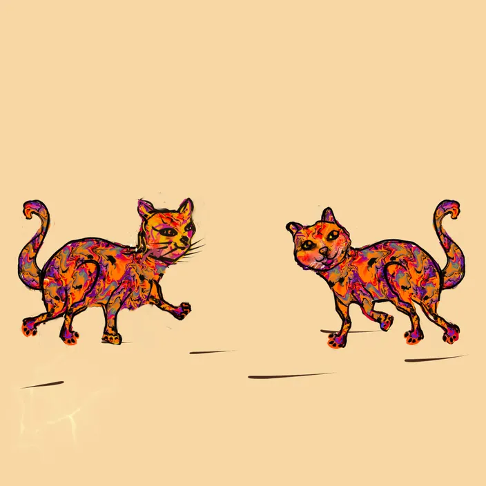 a couple of cats walking across a field