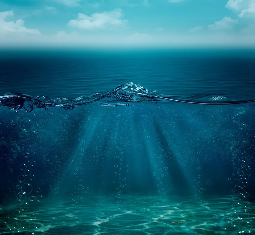 a large body of water with a sky background