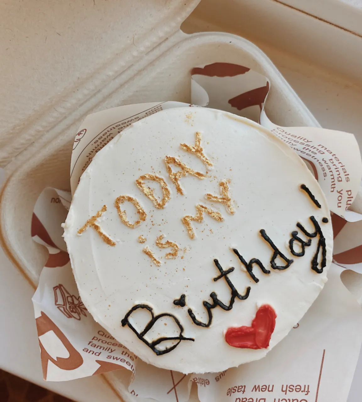 a birthday cake with the words happy birthday written on it