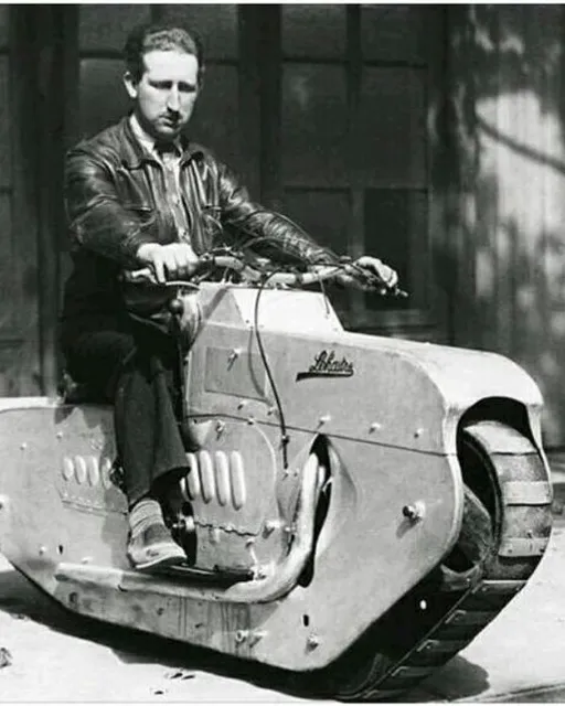 a man riding on the back of a motorcycle