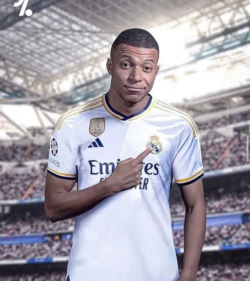 Mbappe in a real madrid uniform standing in front of a stadium