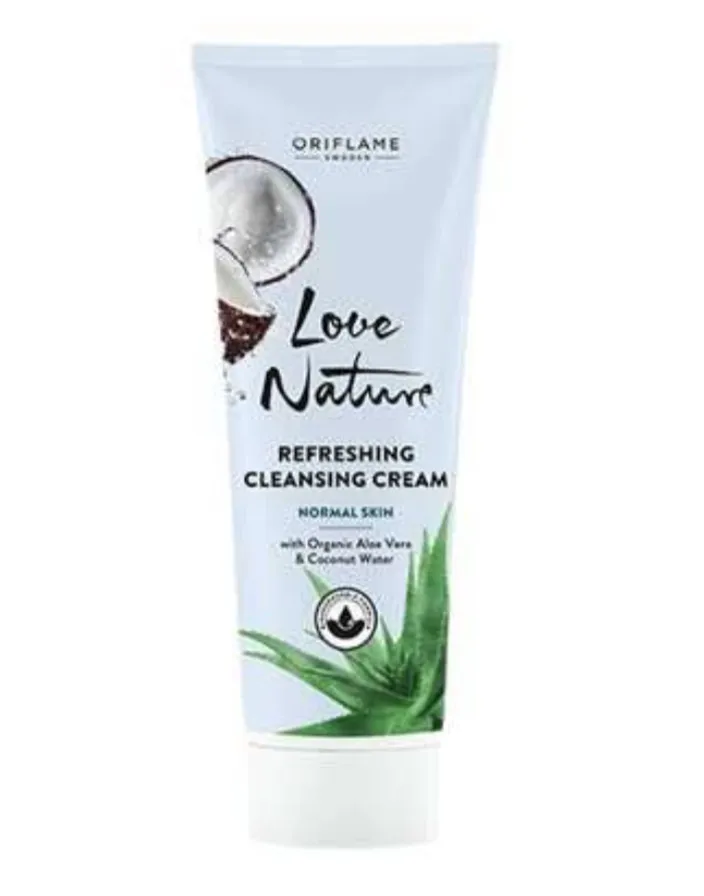 a tube of love nature hand cream on a white background