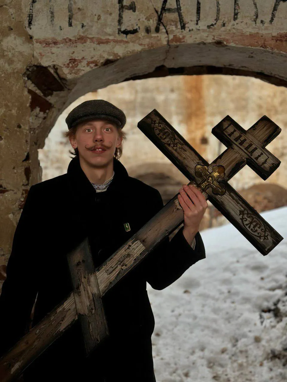 A man holding a cross in a cyberspace