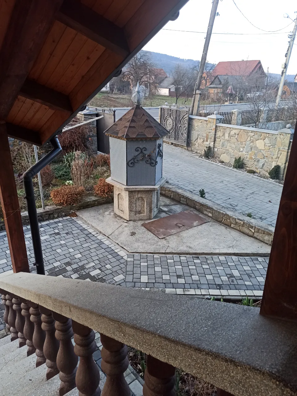 a clock tower sitting on the side of a building