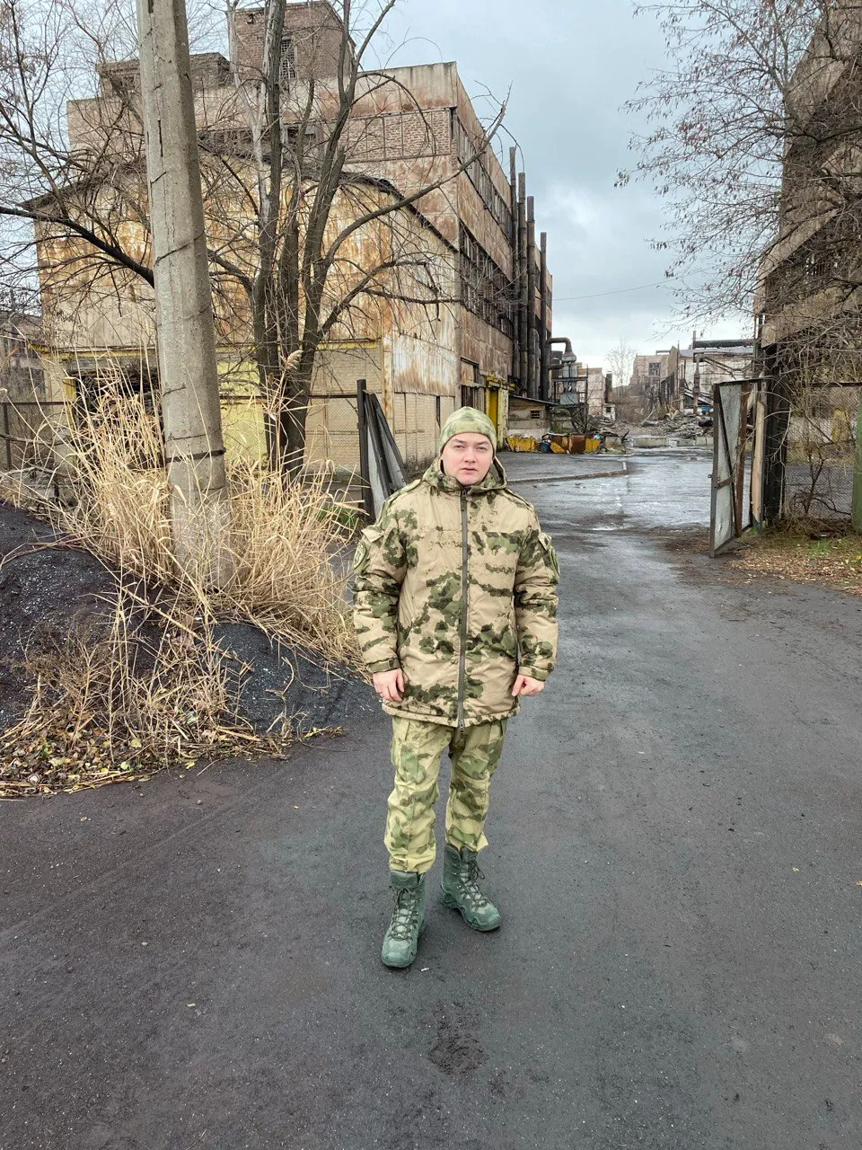 a man standing in the middle of a street