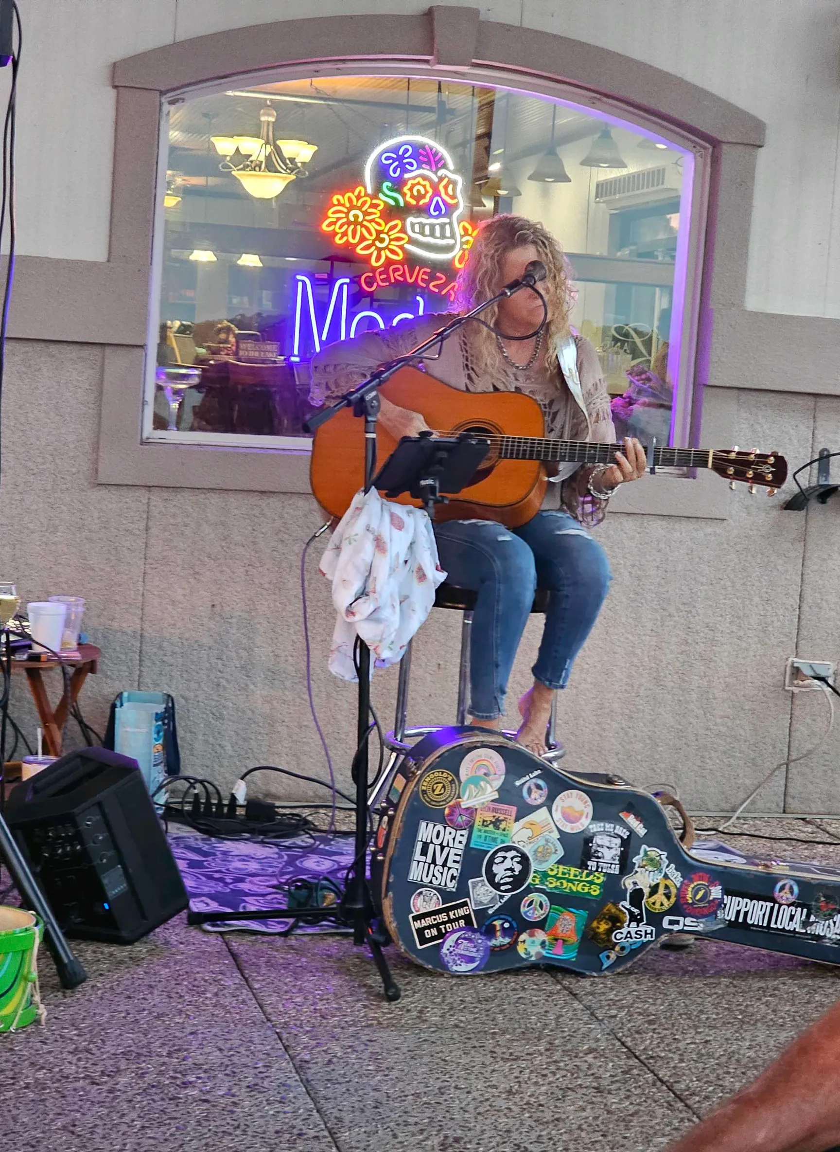 girl playing gutair at the lake, girl sings and plays., advertising style