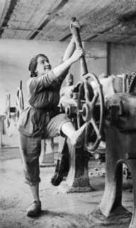 a woman working on a machine in a factory Correct legs and hands, one body and two legs and two hands 